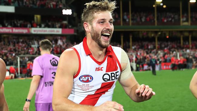 Alex Johnson celebrates Sydney’s win in his comeback game. Picture: Phil Hillyard