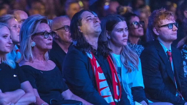 Kate Gudinski, left, Sue Gudinski, Matt Gudinski, his partner Cara McDonald and Ed Sheeran in the front row at Rod Laver Arena. Picture: Mushroom Creative House