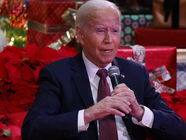 US President Joe Biden speaks during a holiday visit to patients and families at Childrenâs National Hospital in Washington, DC, on December 20, 2024. (Photo by Ting Shen / AFP)