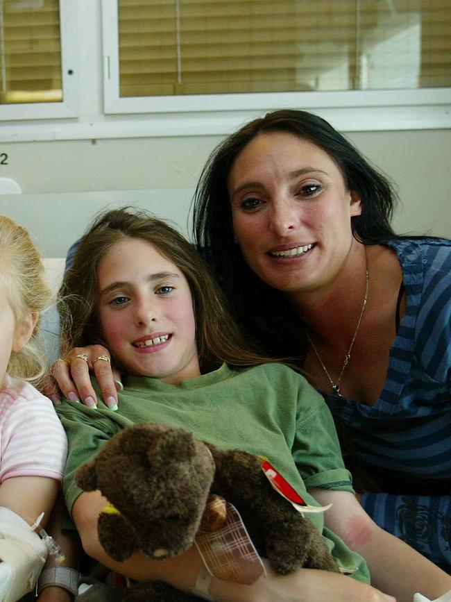 Cheyenne Hammond with her mother Simone Hammond at Flinders Medical Centre after being bitten by a snake.