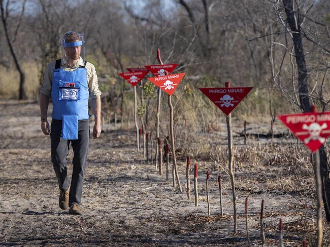 Prince Harry visited the site to see the work of landmine clearance charity the Halo Trust, on day five of the royal tour of Africa. Picture: Dominic Lipinski/Pool via AP