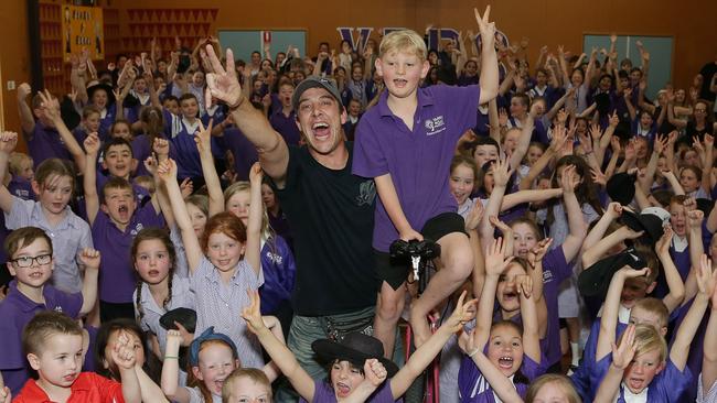 Samuel Johnson was a hit at Yarra Road Primary School as part of his giant tour to promote his charity Love Your Sister. Picture: George Salpigtidis.