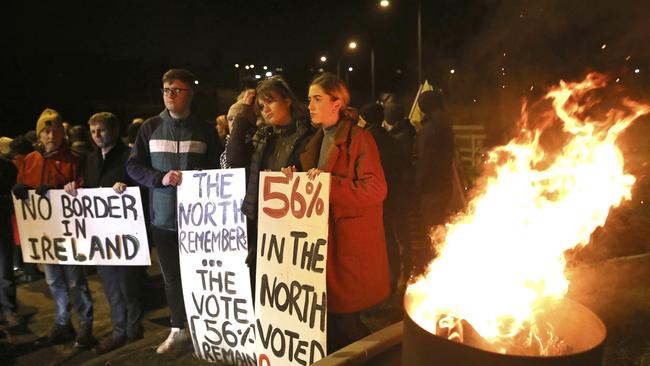 Protesters from the campaign group Border Communities Against Brexit take part in a demonstration in Carrickcarnon on the Irish border, Ireland. Picture: AP