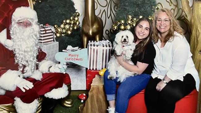 Last Christmas with Santa, Patricia Krain, her daughter and their dog, Benji. Picture: supplied