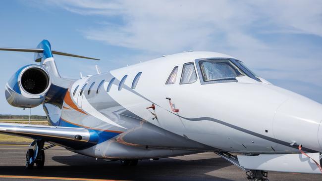 A Flight Options private yet on the tarmac at Sunshine Coast Airport. Picture: Lachie Millard