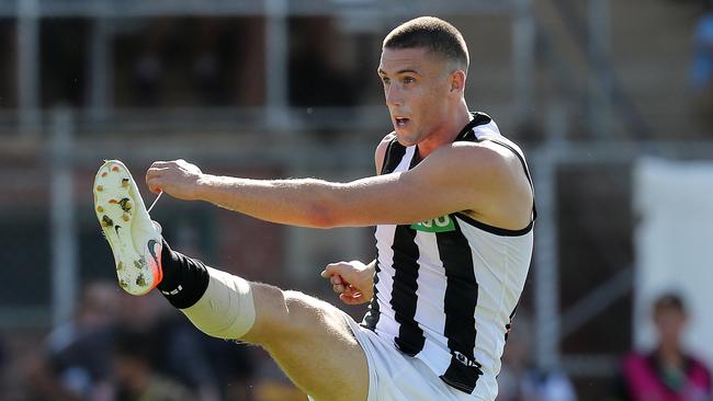 Darcy Cameron launches a shot for goal during his Collingwood debut. Picture: Michael Klein.