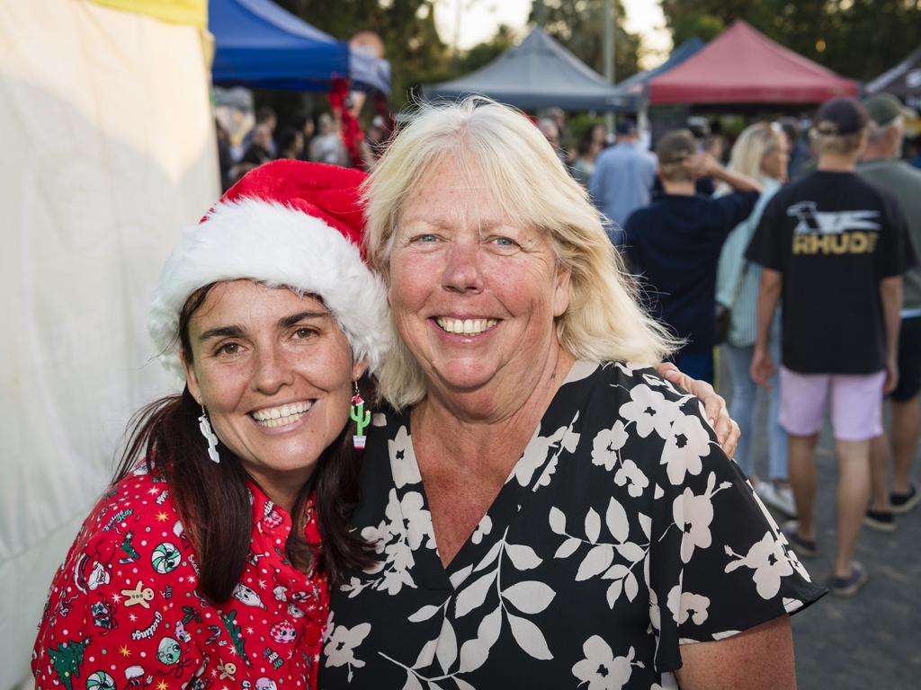 Tiff Spary (left) of The Base Services and Robyn Ayles of Toowoomba Farmers Markets at Twilight Eats at the Windmills. The event hosted by Toowoomba Farmers Markets raised funds to support The Base Services Christmas hamper appeal, Saturday, November 18, 2023. Picture: Kevin Farmer