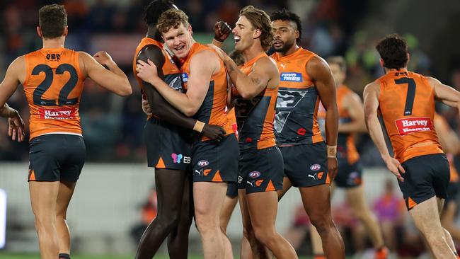 CANBERRA, AUSTRALIA - APRIL 25: Tom Green of the Giants celebrates a goal during the round seven AFL match between Greater Western Sydney Giants and Brisbane Lions at Manuka Oval on April 25, 2024 in Canberra, Australia. (Photo by Jason McCawley/AFL Photos/via Getty Images )