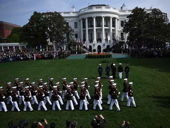 Military personnel prepare on the South Lawn of the White House before the arrival of  South Korean President Yoon Suk Yeol and his wife Kim Keon Hee for a state visit in Washington, DC, on April 26, 2023. (Photo by Brendan SMIALOWSKI / AFP)