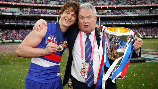 Former Western Bulldogs president Peter Gordon celebrates the 2016 premiership with Liam Picken. Picture: Mark Stewart