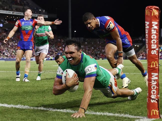 Jordan Rapana dives across to score a try in the Raiders big win.