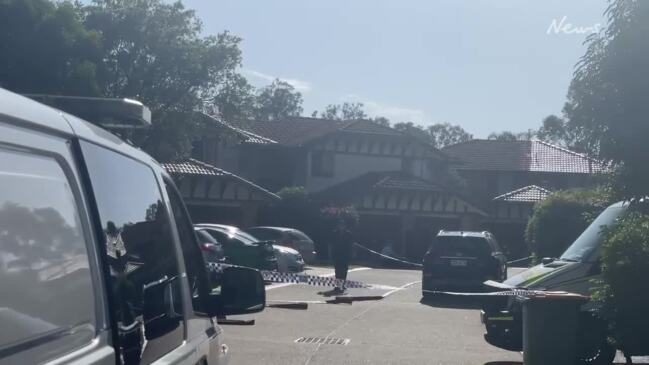 Gold Coast police on scene at a siege in a Labrador unit on Brown Street