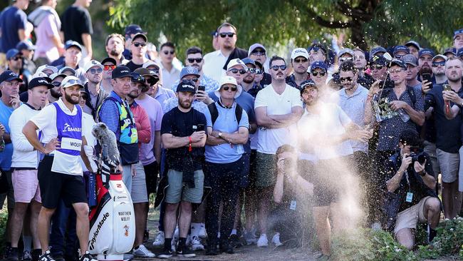 Matthew Wolff of team Smash gets his ball out from the crowd. Picture: Sarah Reed/Getty