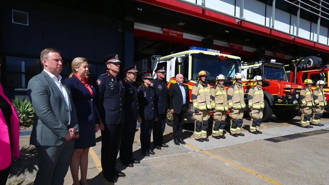 QFES Acting Commissioner Mike Wassing, Queensland Premier Annastacia Palaszczuk and Deputy Premier Steven Miles join crews on-shift at Kemp Place Fire Station to commemorate International Firefighters Day on Thursday. Picture: David Clark