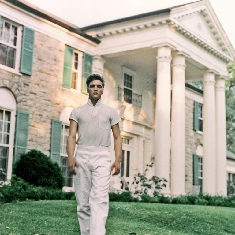 Elvis Presley strolls the grounds of his Graceland estate circa 1957. Picture: Elvis: Direct from Graceland, Bendigo Art Gallery. © EPE