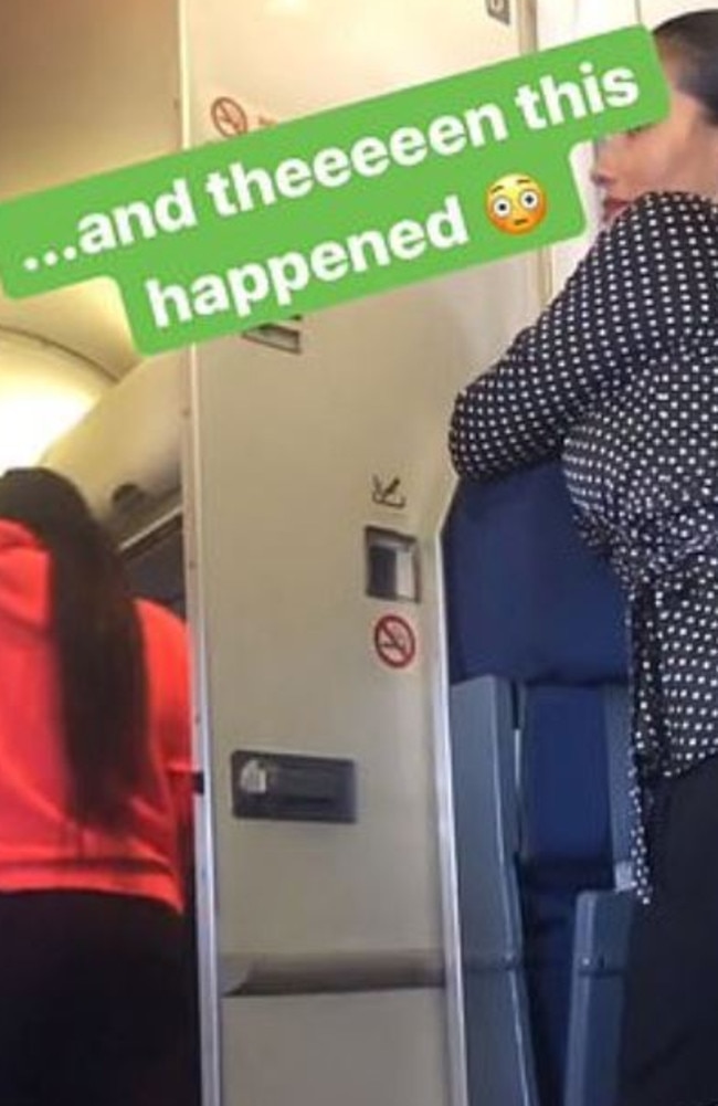 Shortly followed by a woman wearing a matching red jumper. Picture: Instagram.