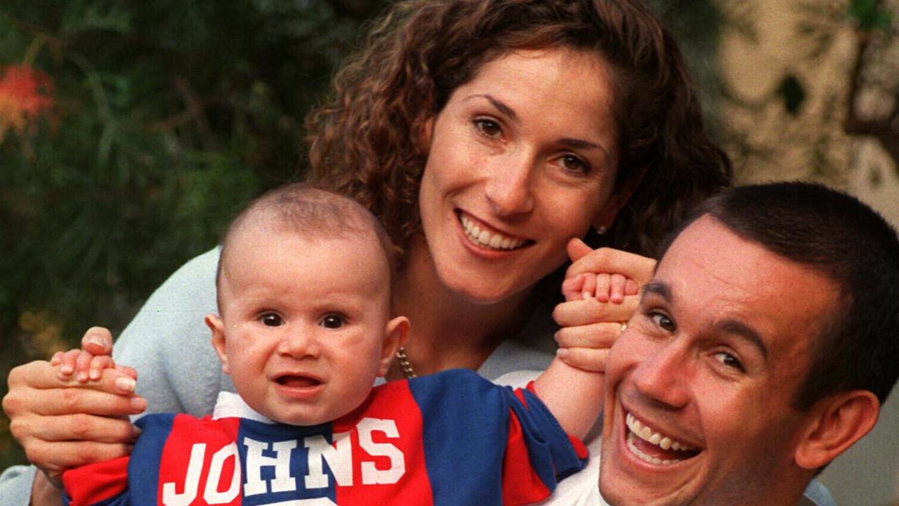 Newcastle player Matthew Johns at home with wife Trish &amp; son Jack, 04/98. Rugby League / John/fam