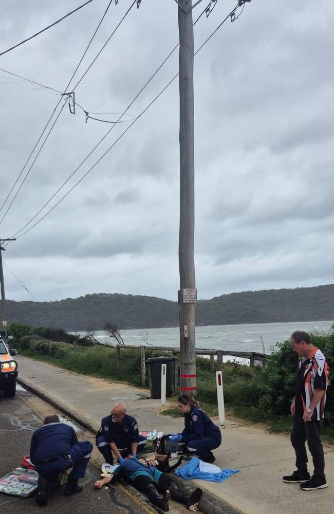 Chris Herbert lies seriously injured after a kite surfing accident at Umina Beach on May 19, in which was blown into powerlines. Picture: TNV