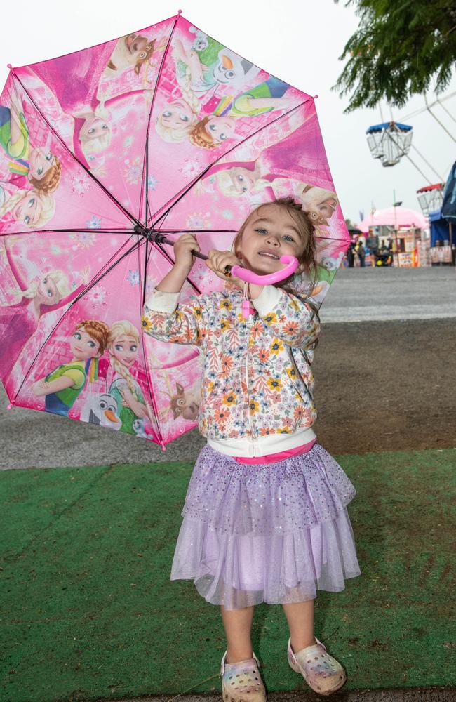 Two-year-old, Amelia Dove, had the perfect umbrella for the rain on Saturday at the Heritage Bank Toowoomba Royal Show. Saturday April 20th, 2024 Picture: Bev Lacey