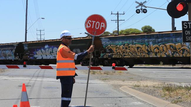 Traffic controllers were set up on Thompson Rd after the near miss. Picture: Peter Ristevski