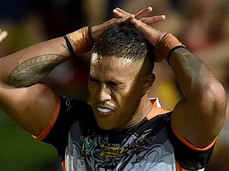 Charged … Wests Tigers player Michael Chee Kam.