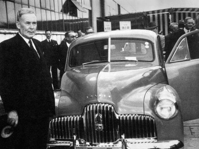 1948: Prime Minister Ben Chifley unveils the new Holden 48-215. Photo: Supplied