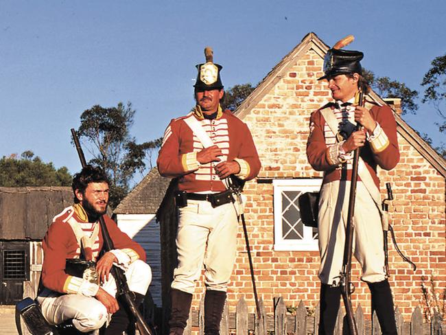 Men wearing period costumes in Old Sydney Town tourist attraction in Somersby, New South Wales Jan 2003. nsw history