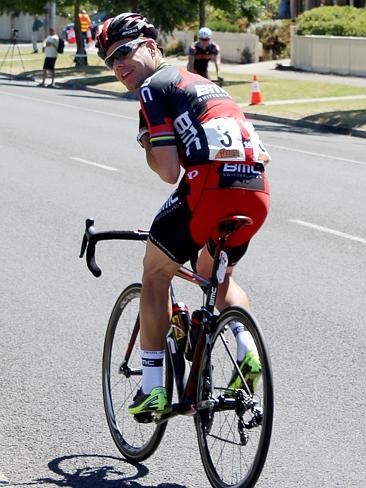 Cadel Evans shares a lighter moment with reporters before the start of the road race. Picture: Reece Homfray.