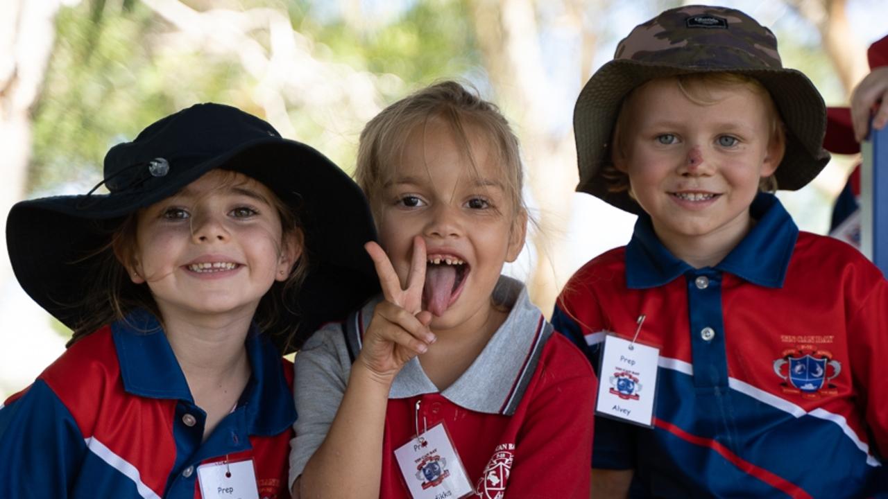 Tin Can Bay State School students Holly, Indikka and Alvey on their first day of prep.