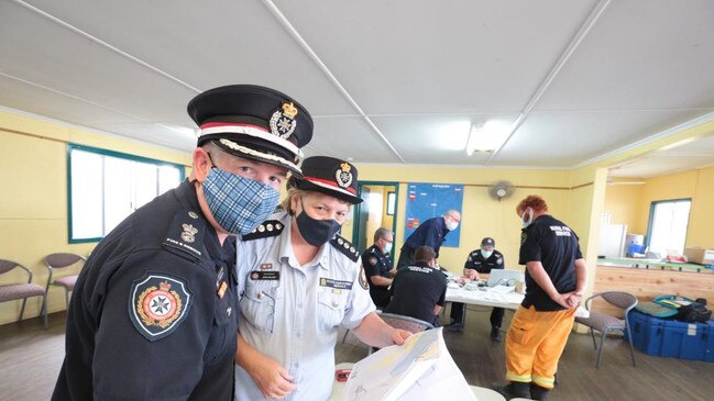 Superintendent John Pappas regional operations centre co-ordination and SES area controller Jenny Millers looking over planning and recovery maps of the Fraser Coast. PHOTO: Robyne Cuerel