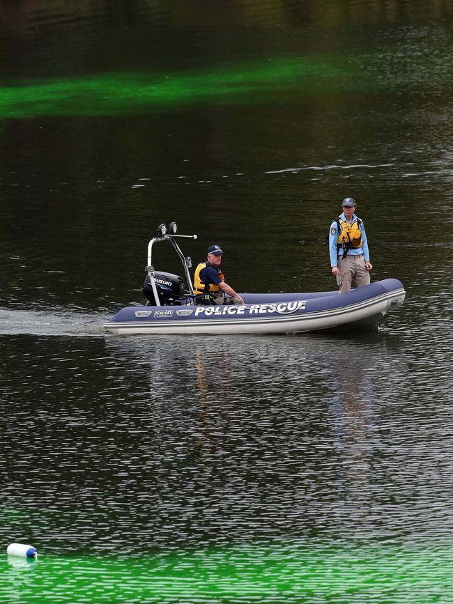 Police dropped green dye in the river