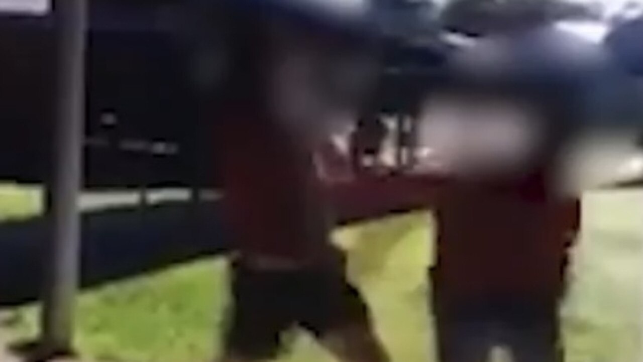 Tin Can Bay State School physical fight escalates between students on school grounds.