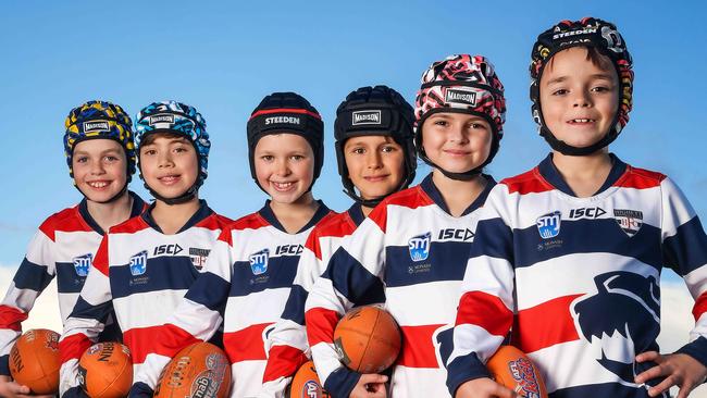 Highett Football Club junior players wearing helmets. Under 9 and 10 players Xavier, Mason, Lenny, Fletcher, Healey and Phoenix. Picture: Ian Currie