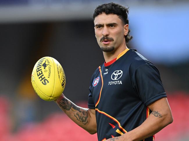 GOLD COAST, AUSTRALIA - MARCH 16: Izak Rankine of the Crows warms up prior to the start of the round one AFL match between Gold Coast Suns and Adelaide Crows at People First Stadium, on March 16, 2024, in Gold Coast, Australia. (Photo by Matt Roberts/AFL Photos/via Getty Images )