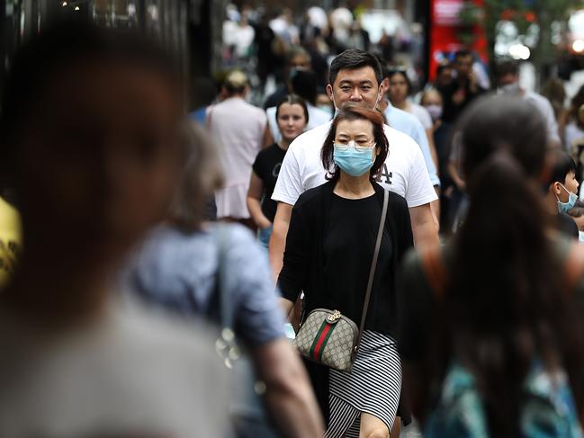 Christmas shopping in Pitt  Street Mall in Sydney has become the latest cluster hotspot with only half the shoppers wearing masks. Jane Dempster/The Australian