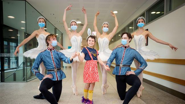 Novalie Morris, 9, with members of the Australian Ballet School. Picture: Mark Stewart