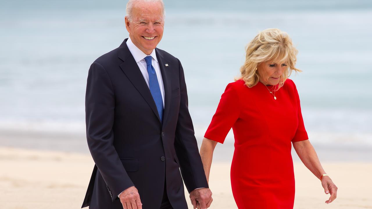 One of these people is happier to be here than the other, who would perhaps prefer to be on a beach in a country where the sun exists. Picture: Jonny Weeks/Getty Images