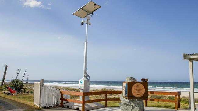 A newly installed CCTV camera hangs over the plaque on Nineteenth Ave at Palm Beach. Picture: Jerad Williams