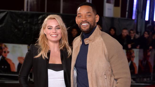 LONDON, ENGLAND - FEBRUARY 11: Margot Robbie and Will Smith attend a special screening of 