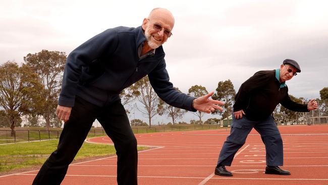 Keilor St Bernard’s Athletic Club head coach Ron Stobaus is a Service to Sport award winner. He is pictured with club president Ian Upton. Picture: Adam Elwood