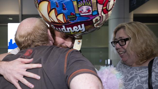 Australians who left Israel were reunited with friends and family at Sydney airport on Tuesday. Picture: NCA NewsWire / Monique Harmer