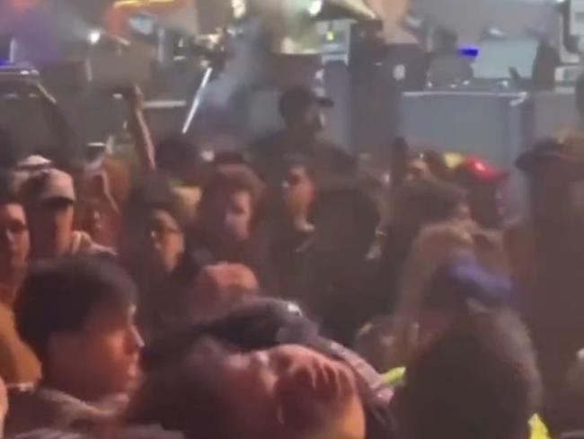 Concertgoers at Travis Scott's Astroworld music festival try to stop the show as the crowd crush begins in Houston, Texas. Picture: Twitter