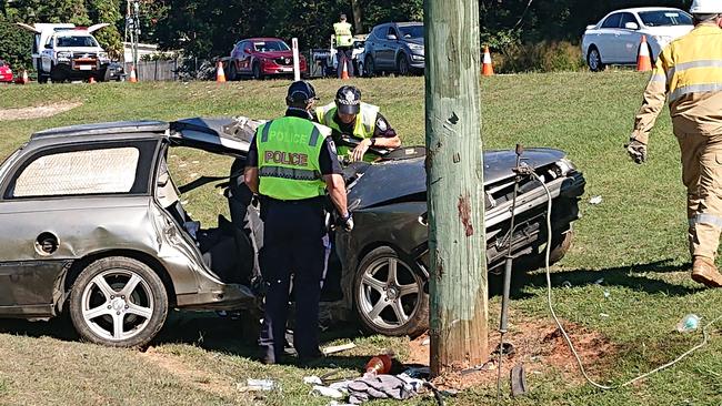 Man dies after car hits powerpole on Cairns road