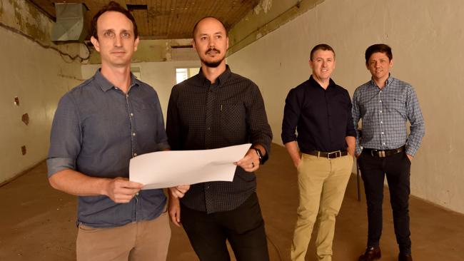 Counterpoint Architecture directors Mark Kennedy and Zammi Rohan with Knight Frank agents Mark Fitzgerald and Dan Place at 487 Flinders Street. Picture: Evan Morgan