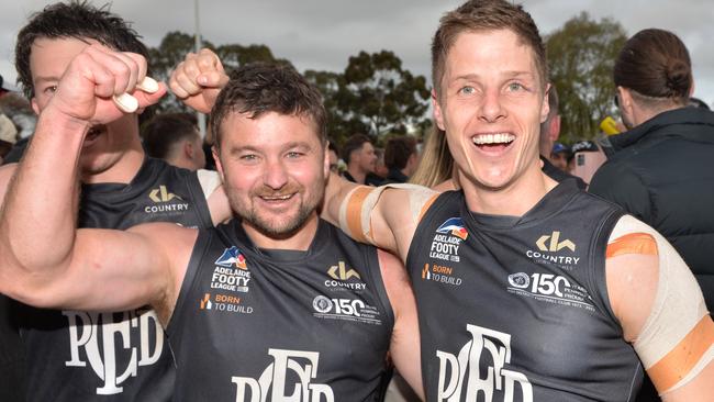 am Gray and Matt Rose celebrate their win over Glenunga in the 2024 division one Adelaide Footy League grand final at Norwood Oval. Picture: Brenton Edwards