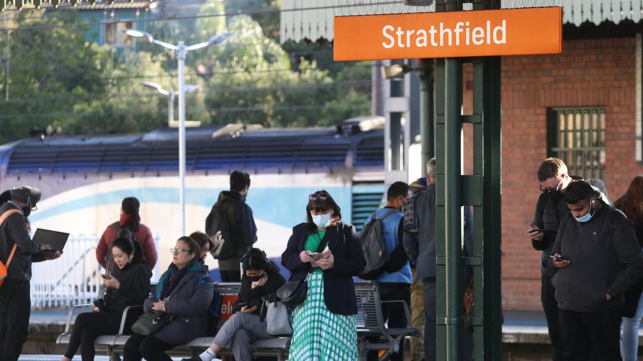 Commuters waiting at Strathfield station as train services arrive every half an hour. Picture: John Grainger