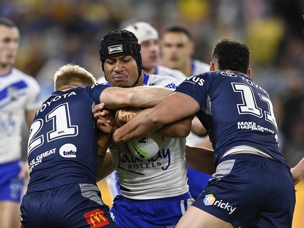 Stephen Crichton of the Bulldogs is tackled during the round 20 NRL match between North Queensland Cowboys and Canterbury Bulldogs at Qld Country Bank Stadium, on July 21, 2024, in Townsville, Australia. (Photo by Ian Hitchcock/Getty Images)