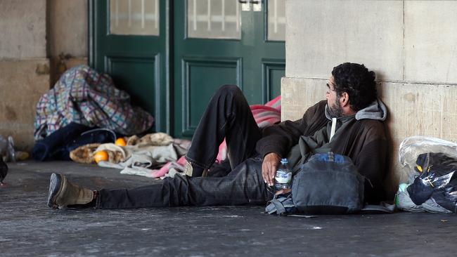 A homeless man pictured at the rear of the station.