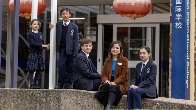 Bilingual program co-ordinator Jenny Xu with students Madelyn, Ethan, Keith and Jiayu. Picture: Kelly Barnes