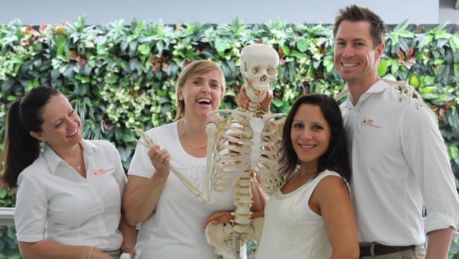 Orion Family Physiotherapy staff Megan Canning and Yvonne Baker with owners Emma and Adam Atherton. IMAGE: EMMA SCHAFER